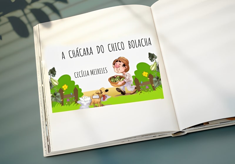 close-up de livro aberto com capa do poema do a chácara do tio bolacha Cecília Meireles 